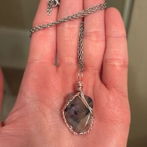 Charoite crystal wrapped in rose gold and silver with a silver chain